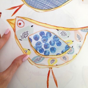 May include: A yellow bird with a blue and white patterned body and orange legs. The bird has a white background with a light green, yellow, and peach pattern.