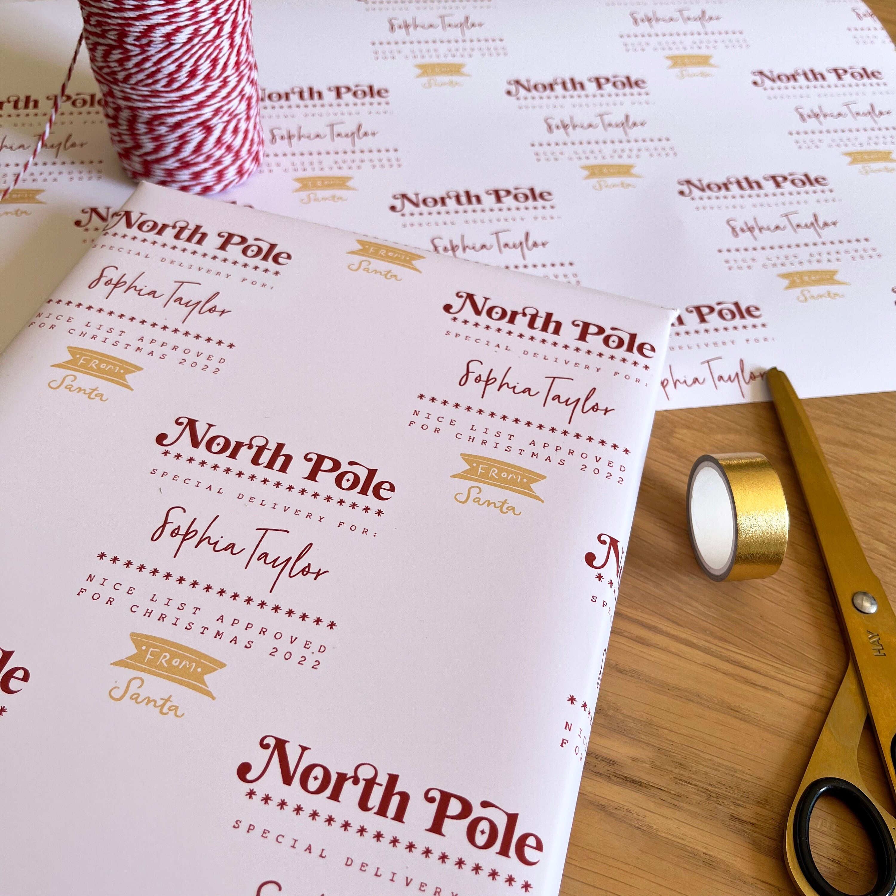 North Pole Badge Personalized Wrapping Paper | Mini & Company