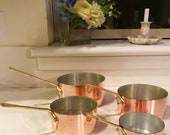 4 Copper pots clad in aluminum