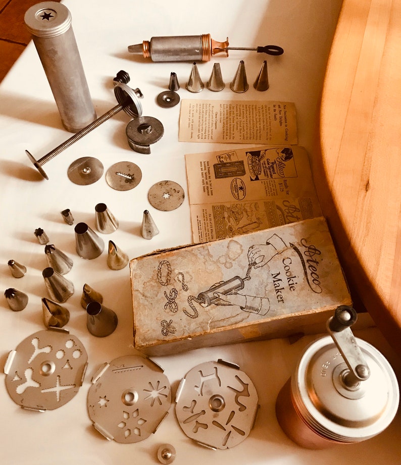 Cookie Presses for Making Holiday Cookies One is for the Pastry Dough