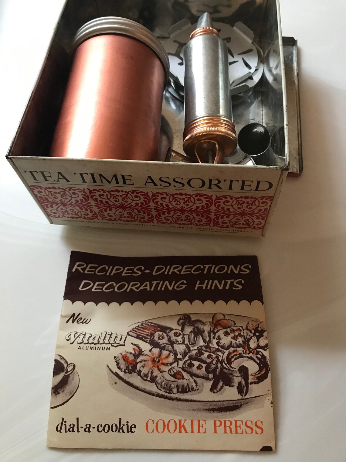 Cookie Presses for Making Holiday Cookies One is for the Pastry Dough