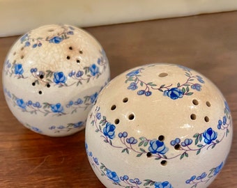 Two round Spice Pomander in blue flower bud detail.