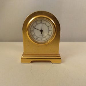 Vintage miniature metal ,gold colored  clock,