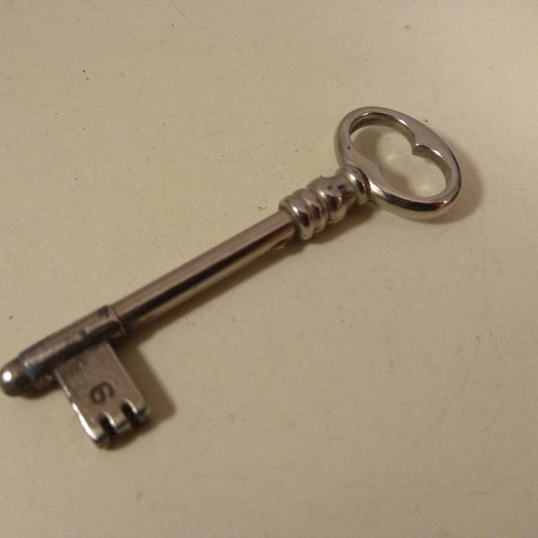 Vintage,Brass key, silver colored