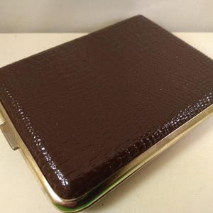 Vintage  metal (snake)  colored ,cigarette , case, ,,,
