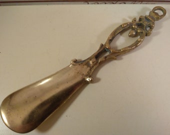 Vintage brass shoehorn, as found