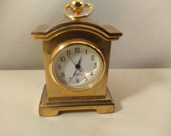 Vintage miniature metal ,gold colored  clock,as found