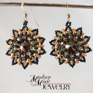 May include: A pair of gold and green beaded earrings with a crystal centre. The earrings are in the shape of a starburst.