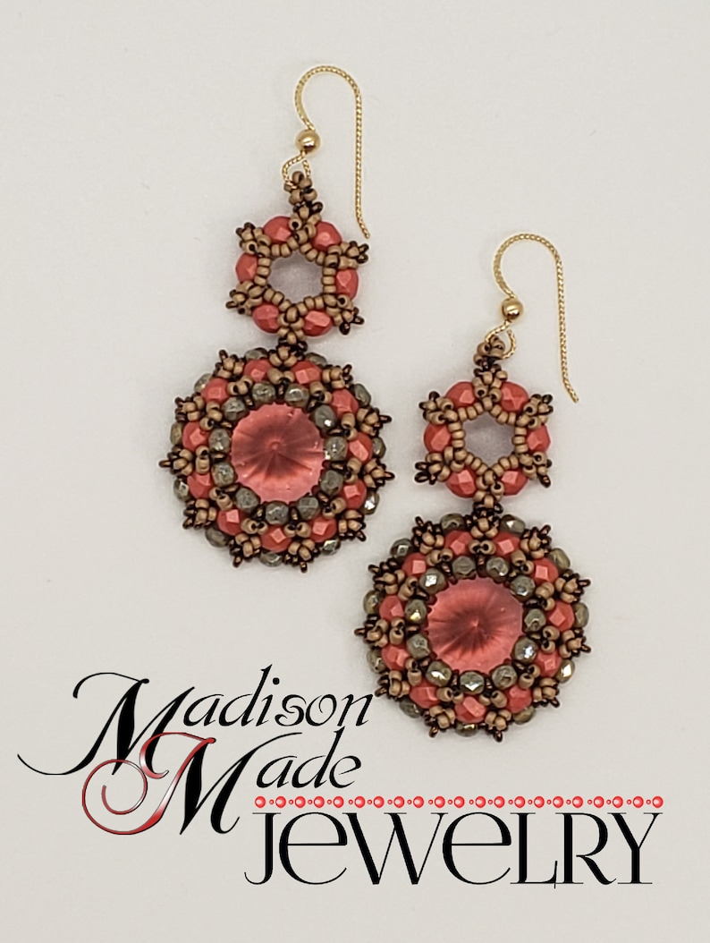 May include: A pair of dangle earrings with a gold hook and two tiers of beads. The top tier is a starburst shape with coral-colored beads. The bottom tier is a round shape with coral-colored beads and a clear crystal in the center. The earrings are accented with gold-colored beads.