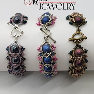 May include: Three beaded bracelets with different colored beads and clasps. The bracelets are made with silver, gold, and dark grey beads. The clasps are silver, gold, and silver.