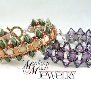 May include: Two beaded bracelets. One is green, tan, and copper with a bronze clasp. The other is purple and silver with a silver clasp. The bracelets have a geometric design. The text "Madison Made Jewelry" is at the bottom.