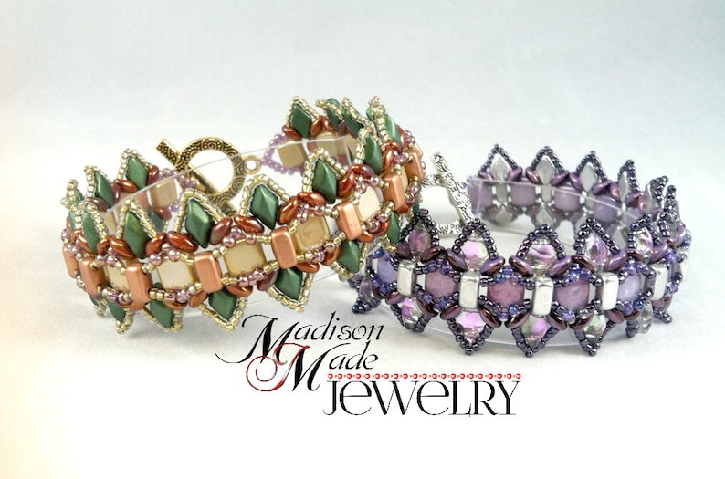 May include: Two beaded bracelets. One is green, tan, and copper with a bronze clasp. The other is purple and silver with a silver clasp. The bracelets have a geometric design. The text "Madison Made Jewelry" is at the bottom.