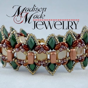 May include: A beaded bracelet with a repeating pattern of green diamond-shaped beads, copper-colored rectangular beads, and cream-colored square beads. The bracelet is labeled "Madison Made Jewelry" in a cursive font.