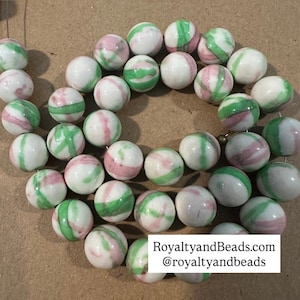 Pink and green beads.