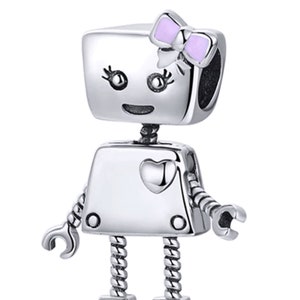 May include: Silver charm featuring a robot with a heart on its chest and a pink bow on its head.