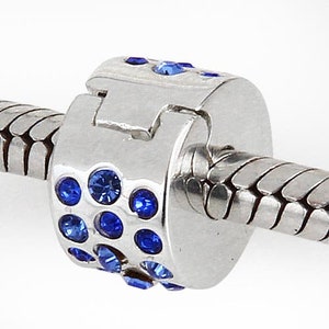 Sterling Silver Clip and Lock &#39;Glamour&#39; Blue Austrian Crystal Charm Clip/Stopper. Compatible with known makes of Charm Bracelets