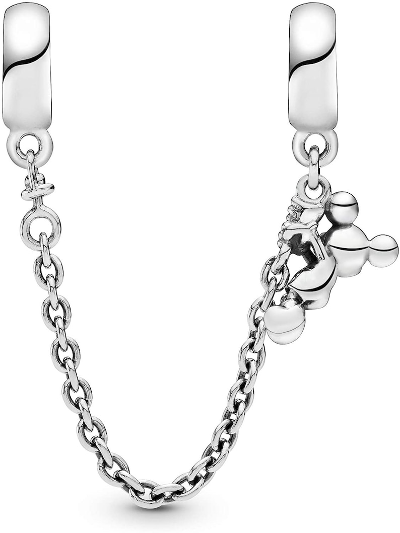 May include: A silver charm bracelet with a Mickey Mouse charm and a chain extender. The charm is a silver Mickey Mouse head with three round ears.