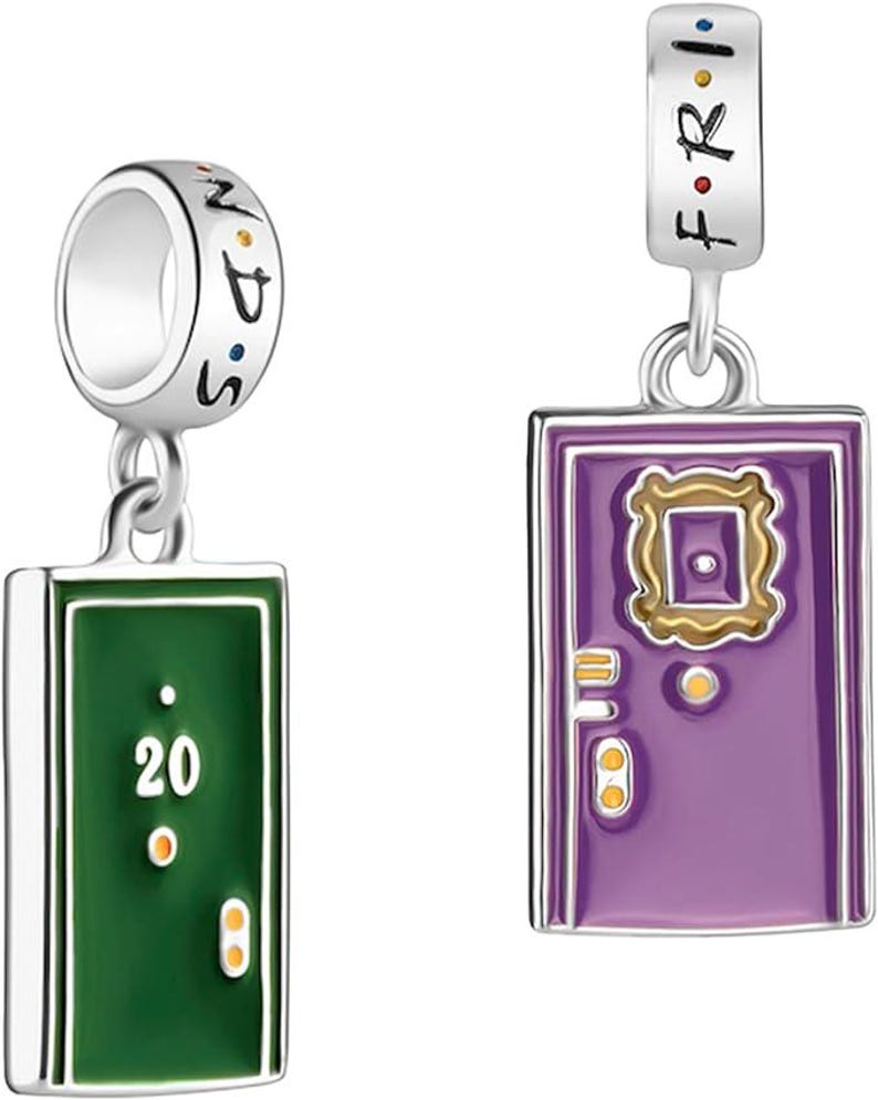 May include: Two charm bracelets with a purple door with a gold frame and a green door with the number 20 on it. The charms are both silver and have the word "FRIENDS" written on them.