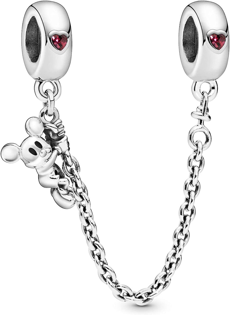 May include: A silver charm bracelet with a Mickey Mouse charm hanging from a chain. The charm features Mickey Mouse holding a rope with a red heart on the end. The bracelet has a red heart charm on each end.