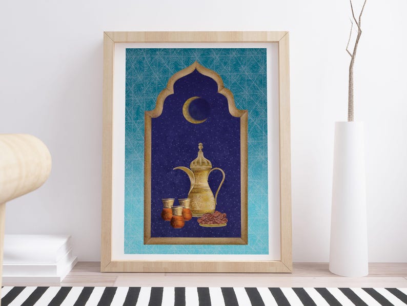 May include: A framed illustration of a gold coffee pot, four glasses, and dates on a blue background with a crescent moon and stars. The illustration is framed in a light wood frame.