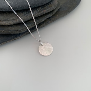 Circular, silver disk pendant, Sterling silver star burst necklace. Great gift for the hard to buy for!