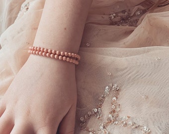 Pink Coral bracelet, made with faux pearls and Sterling silver, would make a perfect flower girl gift or gift for your daughter