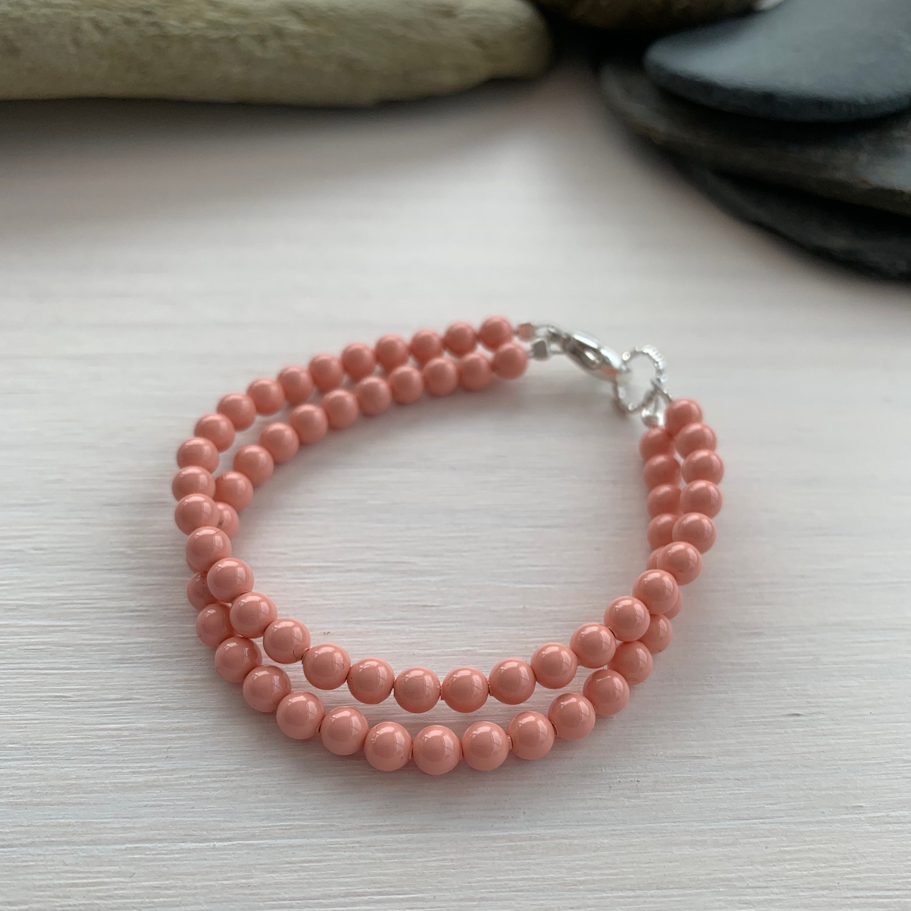 Handmade and Beaded Sherbet Green and White Pearl Bracelet with Coral Pink Accents
