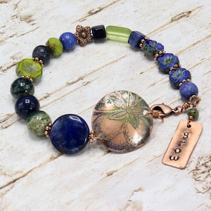 Single Stranded Beaded Bracelet with Flower Etched Copper Piece; Hand-stamped Charm; and Glass and Natural Stone Beads; in Blues and Green