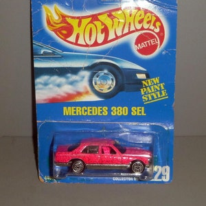 Mattel Hot Wheels Mercedes Benz 380 SEL Metal Flake Paint PINK on Blue Card Includes Pro-Tech Case #229 1991