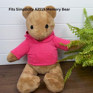 Simplicity A2115 memory bear wearing a pink hoodie.