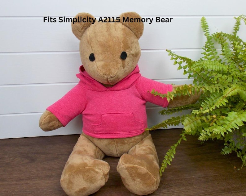 Simplicity A2115 memory bear wearing a pink hoodie.