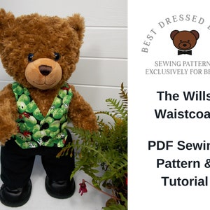 Build a bear teddy bear wearing a green patterned waistcoat, black trousers and black shoes