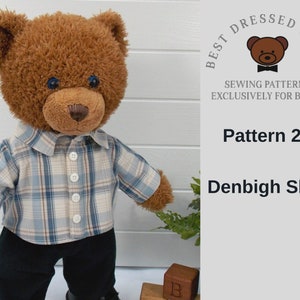 Build a bear teddy bear wearing a checked shirt and black trousers.