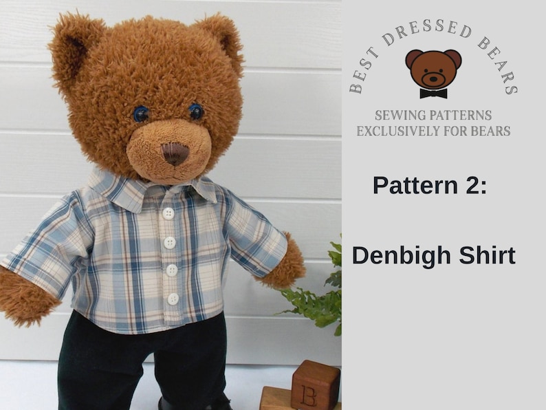 Build a bear teddy bear wearing a checked shirt and black trousers.