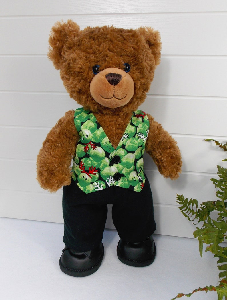 Build a bear teddy bear wearing a green patterned waistcoat, black trousers and black shoes