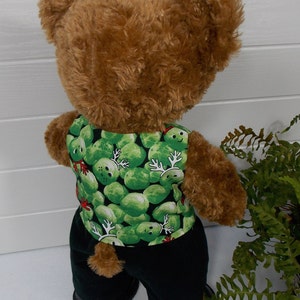 Build a bear teddy bear wearing a green patterned waistcoat, black trousers and black shoes