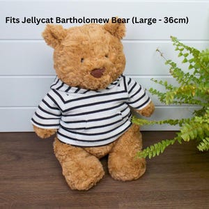 Jellycat Bartholomew Bear wearing a black and white striped hoodie