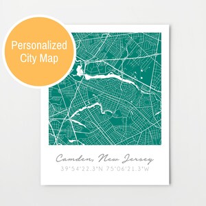 May include: A teal green map of Camden, New Jersey with the city name and coordinates printed below. The text "Personalized City Map" is in a yellow circle at the top left of the image.