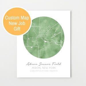 May include: A green watercolor map of Akron Jesson Field in Akron, New York. The text "Congratulations Andrea!" is printed below the map.