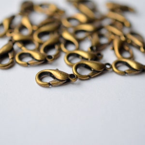 14x7mm Antique Brass Lobster Clasp Closure - High Quality - Ships from USA - 12 Pieces