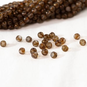 6mm Round Czech Glass Beads with Cut Out Sides, Light Brown with Transparent Windows - 25 Beads