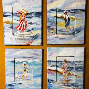 May include: Four rectangular picture frames featuring oil paintings of figures at the beach. Each frame displays a unique scene of a person in striped clothing near ocean waves, with visible brushstrokes and a signature by the artist in the corner.