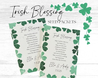 May include: Two white seed packets with green shamrock designs and the text "Irish Blessing" and a traditional Irish blessing. The packets are personalized with the names "Ella & A" and "Ella & Andy" and the date "7.5.25".