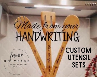 May include: Three wooden kitchen utensils with personalized handwritten messages. The utensils are a spoon, a spatula, and a slotted spoon. The text on the utensils reads "Love Always Mom". The utensils are displayed against a white background with the text "Made from your HANDWRITING CUSTOM UTENSIL SETS" above them.