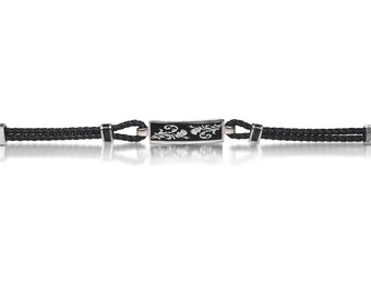 Silver bracelet with leather. Floral Design