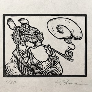 May include: Black and white woodcut print of a rabbit wearing a suit and smoking a pipe. The rabbit is looking to the right and has a serious expression. The print is numbered 1/20 and signed "J. Fenwick".