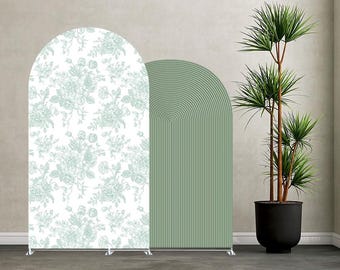 May include: Two arched backdrop panels standing side by side. The left panel features a white surface with a light green floral pattern. The right panel is solid light green with a vertical ribbed texture. Both panels have a rounded top edge.