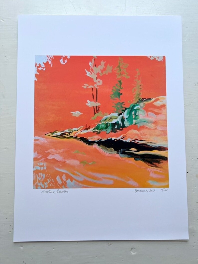 May include: A colorful abstract painting of a landscape with trees and water. The painting is done in shades of orange, yellow, green, and blue. The artist's signature and the date "November 2022" are visible in the bottom right corner. The number "11/100" is also visible, indicating this is a limited edition print.