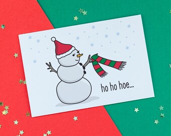 Tarjeta navideña con muñeco de nieve divertido