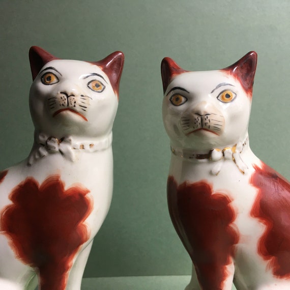 Wonderful Pair of Antique Staffordshire Cats with a Wonderfully Expressive Attitude